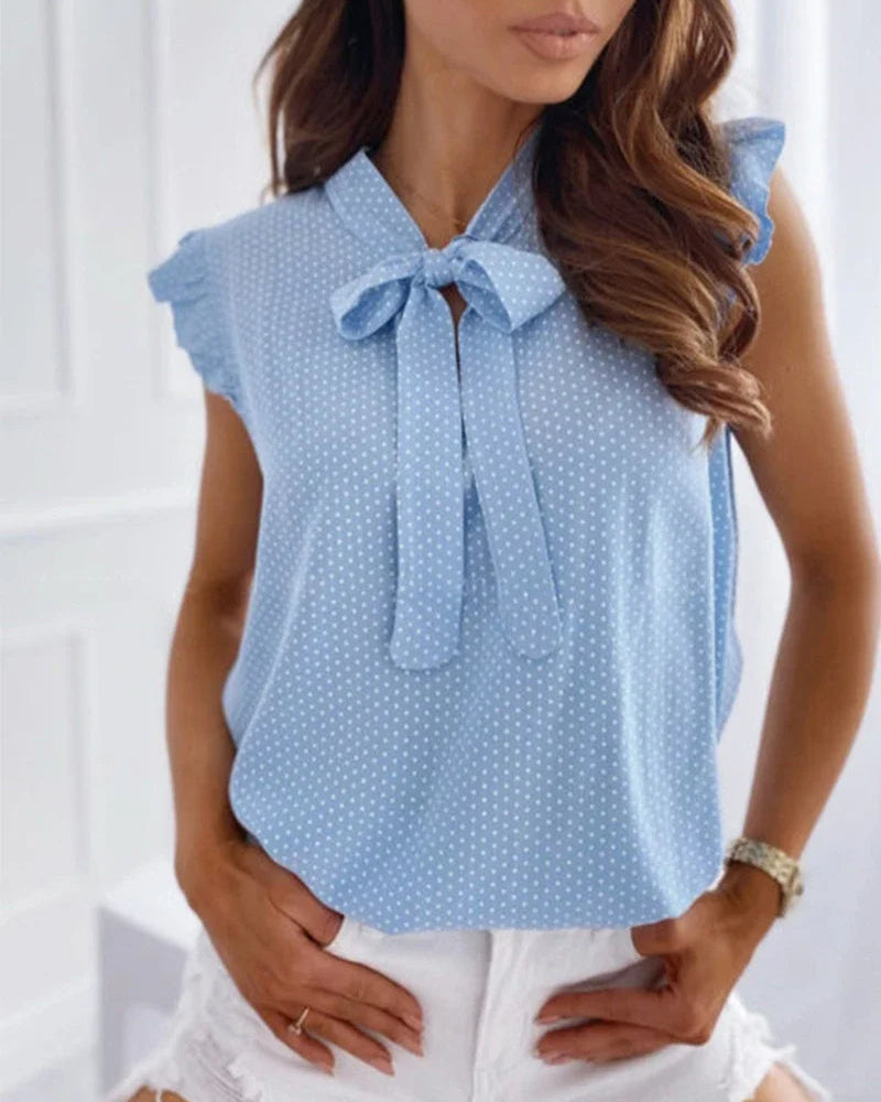 Sleeveless Blouse with Ruffles and Bow Detail