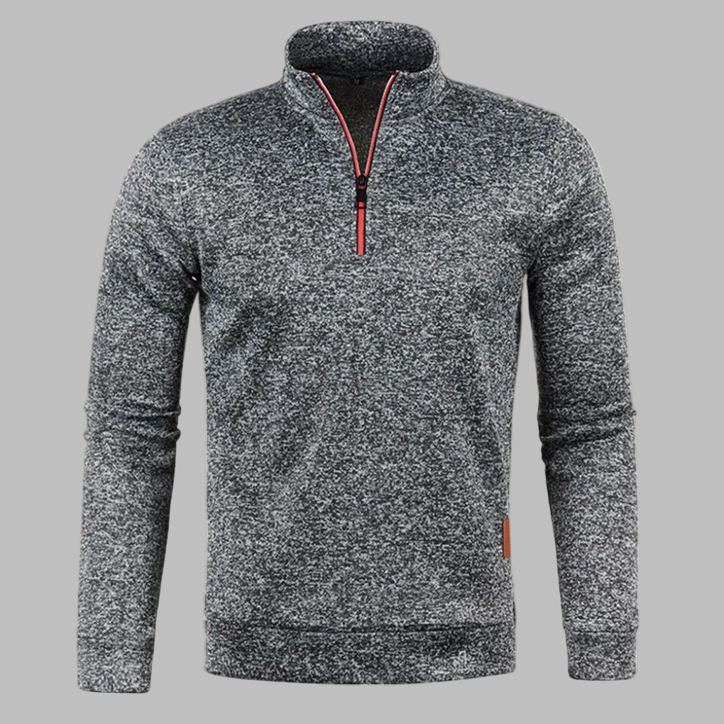 Donkergrijze herenfleece met halve rits, comfortabele pasvorm, ideaal voor outdooractiviteiten. Stijlvolle en warme trui voor herfst en winter.
