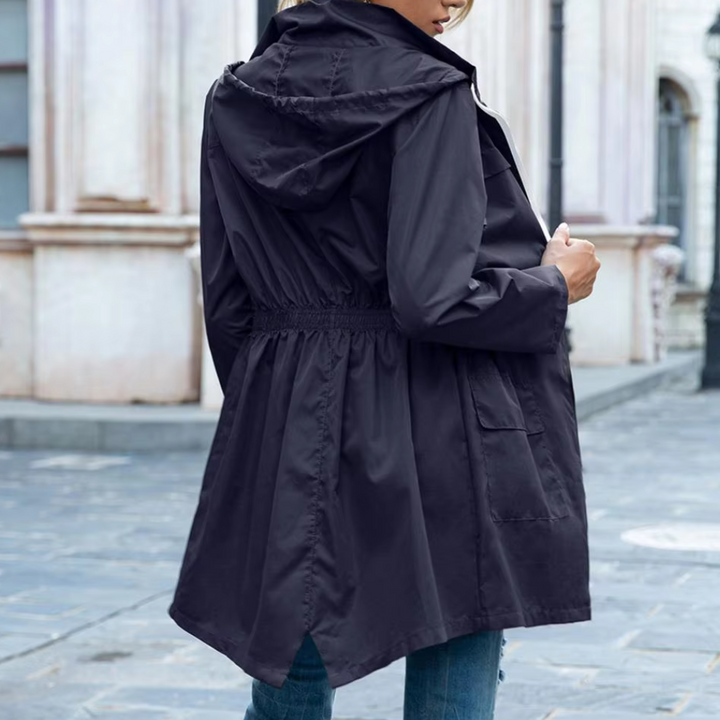 lange blauwe trenchcoat voor dames