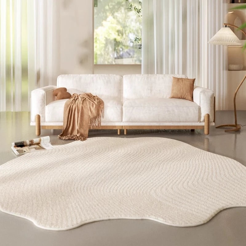 Area Rug with Irregular Wavy Edge and Textured Plush Pile Pattern
