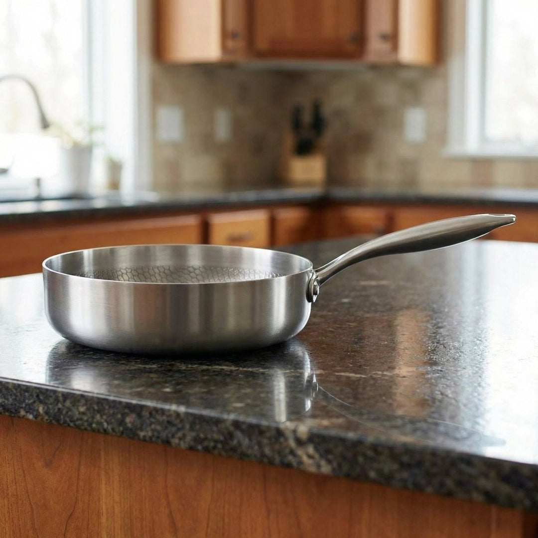 Hammered titanium frying pan with high sides