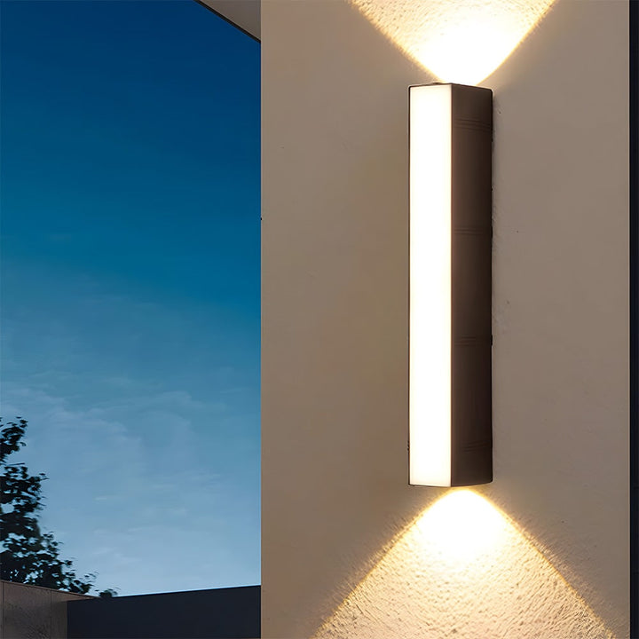 Outdoor Wall Sconce with Up and Down LED Lighting and Modern Architectural Design