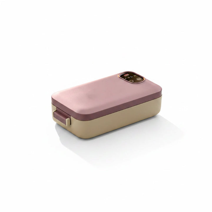 Cordless, self-heating electric lunch box with stainless steel insert.